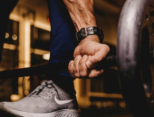 person about to lift barbell
